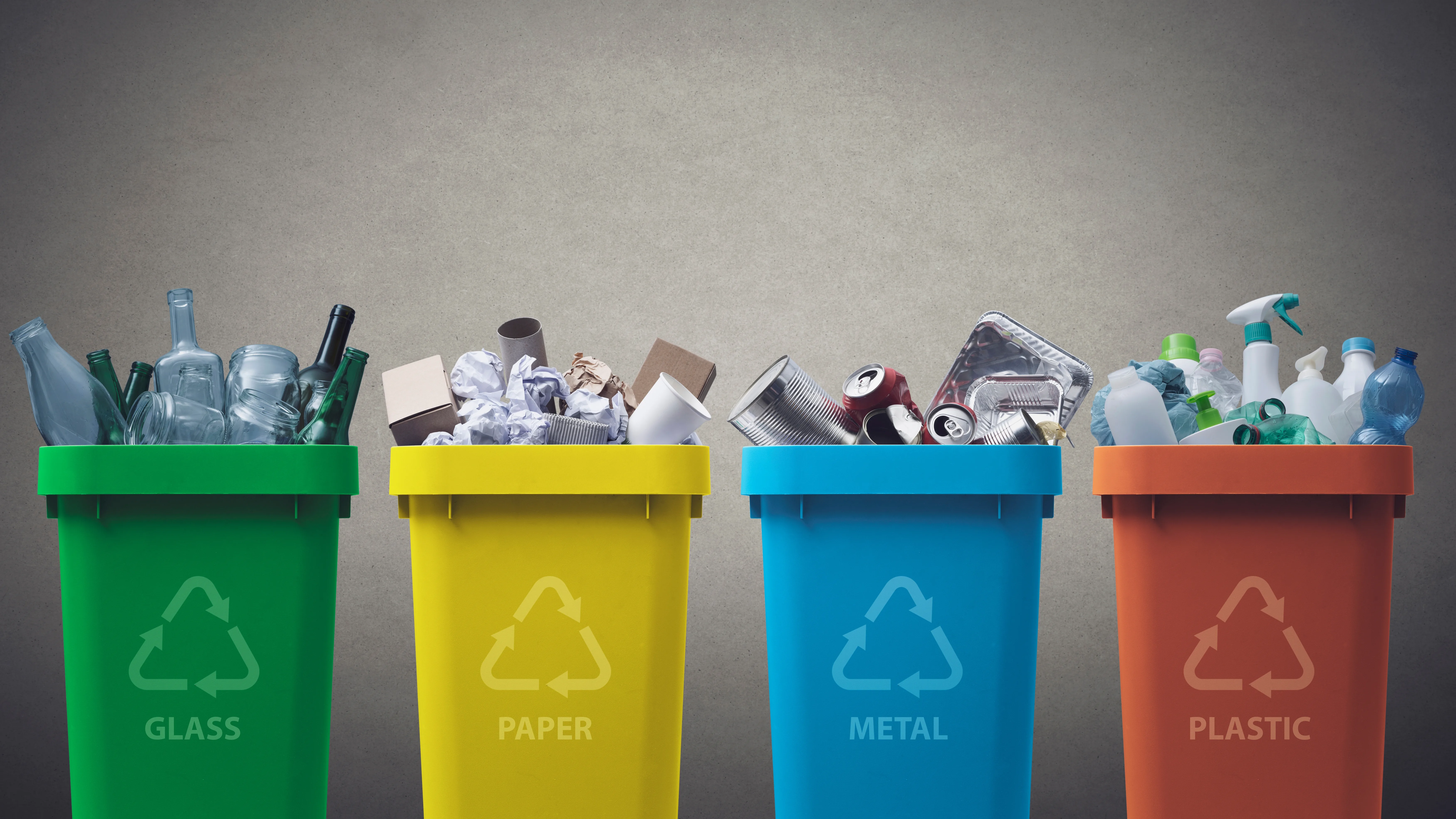 Colour-coded recycling bins for glass, paper, metal and plastic
